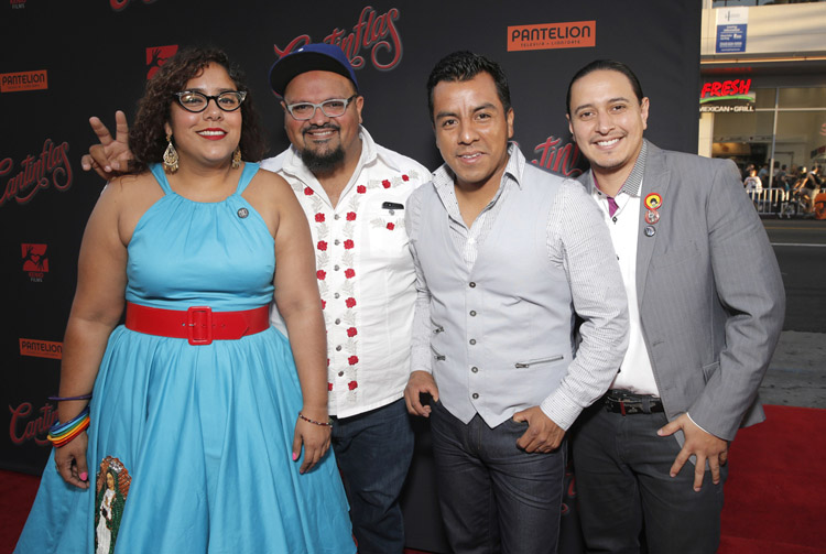 La Santa Cecilia band members Marisol "La Marisoul" Hernandez, Alex Bendana, Pepe Carlos and Miguel Ramirez attend the premiere of Pantelion Film's 'Cantinflas' at TCL Chinese Theatre on Wednesday, August 27, 2014 in Los Angeles. (Photo by Todd Williamson/Invision for Pantelion Films/AP Images)